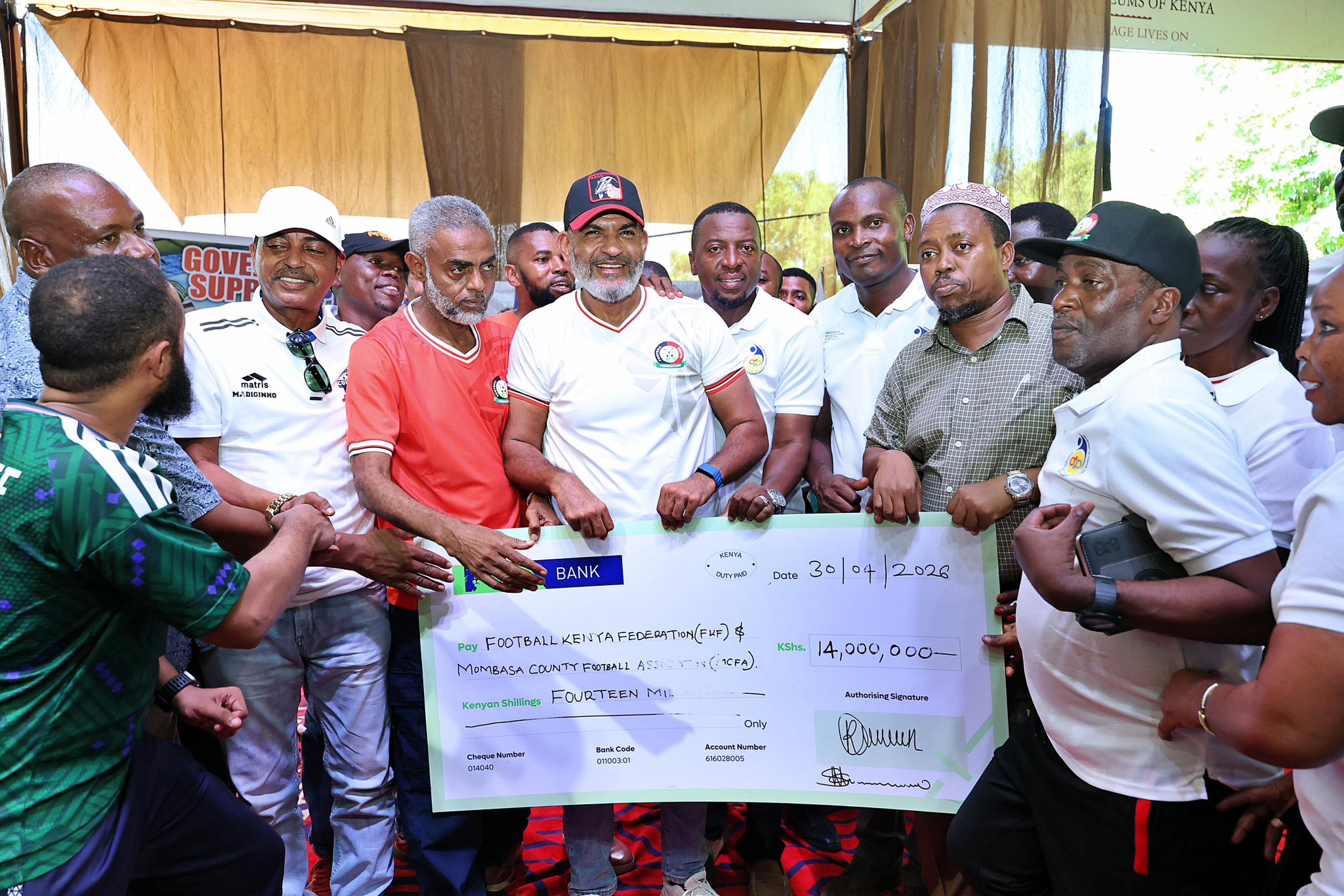Mombasa football funding — Governor Abdulswamad Nassir presents Sh14 million cheque to FKF and MCFA representatives