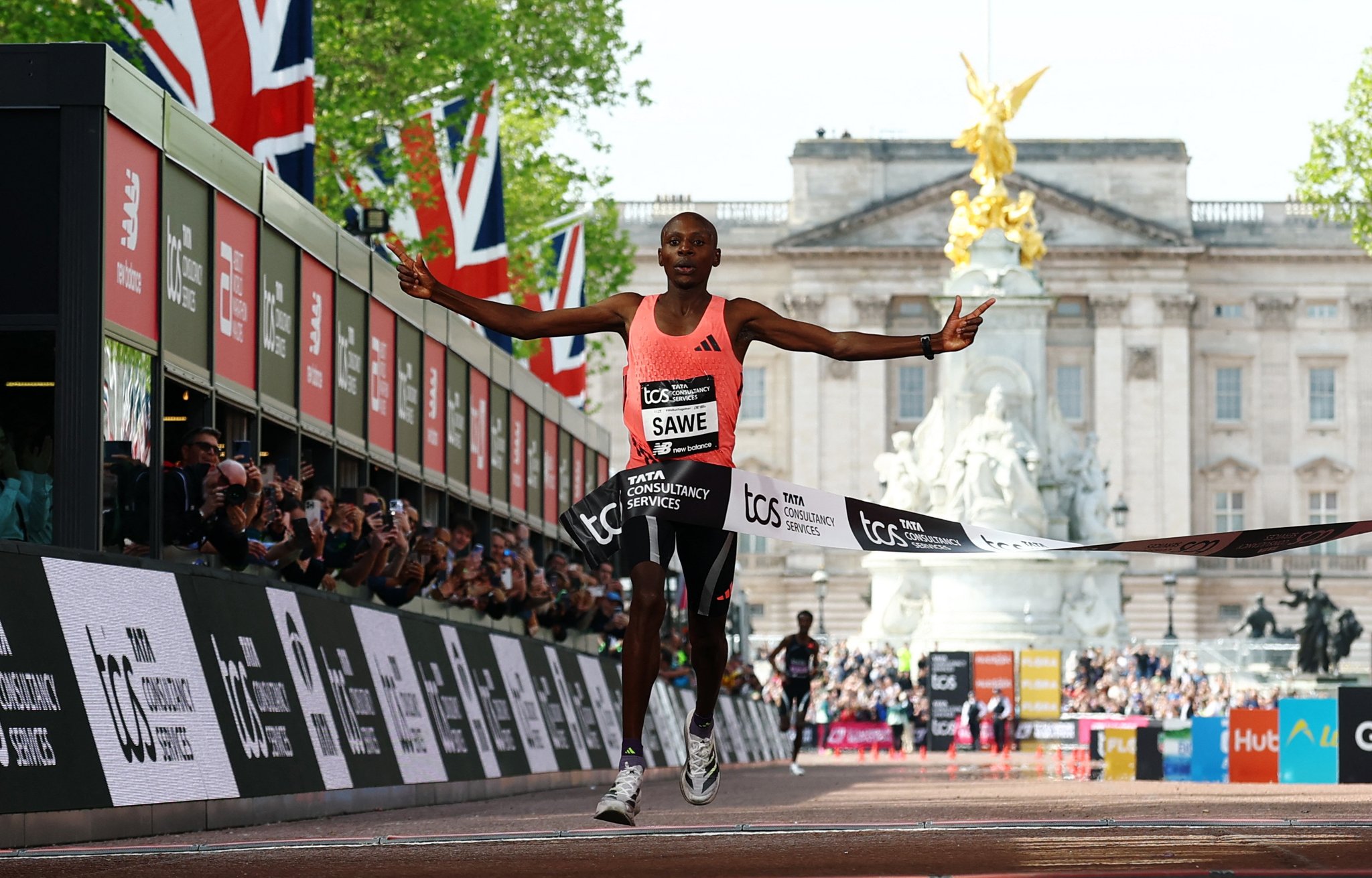 Sabastian Sawe London Marathon 2026 world record sub two hours finish line Buckingham Palace